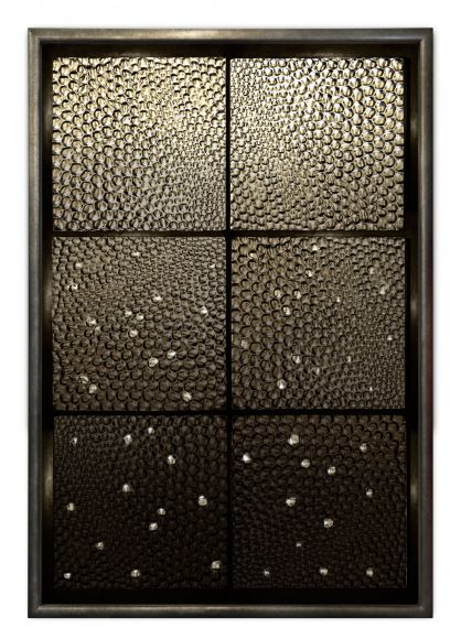 Pebbles in a deluxe handmade frame.